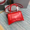 Small Handbag in pink and other color shiny box calfskin with aged-silver hardware shoulder bag one handle and adjustable and removable crossbody strap