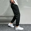 Pantaloni da uomo Pantaloni da jogging alla moda Pantaloni sportivi sottili con coulisse Stile sportivo casual Assorbente per il sudore