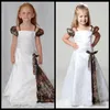 Härlig Camo Flower Girl Dresses Spaghetti Straps Cap ärmar Golvlängd kamouflage Första nattvardsklänning Kids Kvällsklänningar200f