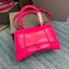 Small Handbag in pink and other color shiny box calfskin with aged-silver hardware shoulder bag one handle and adjustable and removable crossbody strap