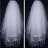 ブライダルウェディングドレス用のビーズリボンエッジウェディングアクセサリー付きの3つのレイヤーショートチュールウェディングブライダルベールVEIL282L