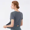 女性用の女性用ポロスワークアウトトップスプリットバックアスレチックジムエクササイズシャツルーズフィット
