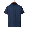 T-shirt da uomo T-shirt polo firmate da uomo Vestiti Patchwork sulle spalle Polo con colletto rovesciato Tshirt in cotone 100% traspirante Abbigliamento Homme di lusso