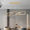 Lampadari Lampadario a LED in acciaio inossidabile di lusso nordico Cerchi Lampada ad incastro Isola della cucina Illuminazione del soggiorno Vendite dirette della fabbrica