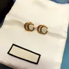 Lady Luxury Earrings Gold Double Letter Kvinnor smyckesdesigner som kör örhänge Interlocking Silver rostfritt stål ringar ohrring görhängen