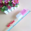 Brosse de nettoyage de bouteille de lait de bébé de qualité alimentaire en gros avec des couleurs de mélange de crochet