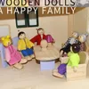 Dockor trämöbler miniatyr leksak mini trägockor familj doll barn barn hus spela leksak pojkar flickor gåvor 230721