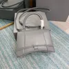 Small Handbag in pink and other color shiny box calfskin with aged-silver hardware shoulder bag one handle and adjustable and removable crossbody strap
