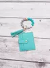 PU Tassel Card Bag Portachiavi da polso Bracciale con perline in silicone Portachiavi portatile da donna