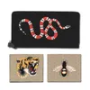 Carteras de diseñador para hombres Moda Hombres de alta calidad Animal Cartera corta Cuero Serpiente negra Tigre Abeja Hombre Carteras Monedero de mujer Titulares de tarjetas Monederos de mujer JN8899