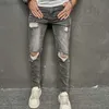 Jeans da uomo Jeans skinny elasticizzati grigio fumo da uomo Moda buco strappato Vintage Raw Edges Pantaloni in denim hip-hop Pantaloni streetwear per giovani L230724