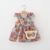 Robes de fille Robe de bébé d'été Vintage Garden Flower Flying Sleeve avec sac de paille 230724