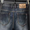 Jeans da uomo Streetwear Jeans strappati Moda uomo Retro Personalità fatiscente Vernice dritta Spot Graffiti Pantaloni in denim Uomo L230724