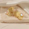 Pendientes de tuerca ANEEBAYH de acero inoxidable con textura de mariposa para mujer, declaración de Metal chapada en oro de 18 quilates, joyería elegante de moda de Francia