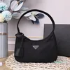 Designer Fashion Shoulder bag Nylon Fabric Crescent Bag Triangle tote Lightweight simple handbags Black Underarm bag Baguette shape women's bag