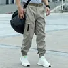 Męskie spodnie kombinezon 2023 Spring i jesienne styl Shackle Youth Vitality wolny rozmiar duży rozmiar