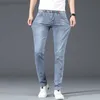 Jeans da uomo New Fashion Brand Slim Jeans skinny blu grigio Uomo Business Casual Classic Cotton Trend Elastic Youth Pencil Denim Pantaloni L230728