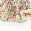 Robes de fille Robe de bébé d'été Vintage Garden Flower Flying Sleeve avec sac de paille 230724