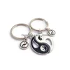 مفاتيح مفاتيح Lanyards Fashion Yin و Yang Tai Chi Sitching Alloy Black White Best-Friends زوجان من جلود مفاتيح مفاتيح مفاتيح.