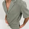 Herrspårar män sätter sommar casual shortsleeved skjorta shorts mode randig kostym twopiece set tracksuit ropa para hombre 230724