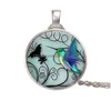 Pendentif Colliers Alliage Peint Hibou Temps Verre Collier De Mode Taiji Bleu Colibri Lune Ange Chandail Chaîne Pour Les Femmes Cadeau Drop Dhpno