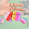 Keychains Lanyards Sile Keychain Mini Fidget Toy Key Chain Autism Handhållen liten push Pop Stress Sensory Fidget Keychain J230724