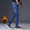 Jeans pour hommes 2022 hiver hommes noir Slim Fit Stretch épais velours pantalon chaud Jeans décontracté polaire ligne pantalon mâle Plus velours pantalon hommes L230724