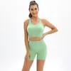 Set attivi 2 pezzi Reggiseno sportivo sexy Yoga Hip Lift Pantaloni Fitness Set Abbigliamento sportivo Pantaloncini senza cuciture lavorati a maglia