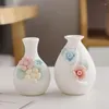 Vaser kreativa kinesiska handhållna keramiska vaser hem vardagsrum sovrum dekoration vit porslin blomma ware enkel