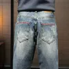 Mäns jeans jeans för män harem byxor brett ben lös passform retro blå baggy jeans man fickor designer streetwear herrar kläder full längd l230724