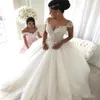 Najnowsza suknia balowa z krótkim rękawem Suknie ślubne Aplikacje z koralikami koronki do tyłu tiulowe suknie ślubne księżniczka plus rozmiar panny młodej ślub GO294N