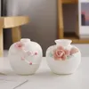 Vaser kreativa kinesiska handhållna keramiska vaser hem vardagsrum sovrum dekoration vit porslin blomma ware enkel