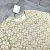 Chemise homme Couple Printemps/Été Nouveau Imprimé All Over Petit Poulet Jaune Brodé Col Rond Manches Courtes t-shirt sac coach bandoulière