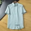 Mäns avslappnade skjortor högklippt etikett Trade Tail Single Shirt Summer Fashion Kort ärm Top Ropa -kläder för män