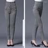 Kvinnors jeans kvinnor denim blyerts ben smal passar hög midja snäv passande stor storlek S-4XL märke elastiska modebyxor