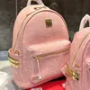 Diseñadores de cuero de alta calidad Mochila Bolsa Mujer Mochilas Mochilas de diseñador Bolsos Moda Casual Mochila pequeña Estilo 32 22 CM CJD2307243