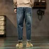 Mäns jeans kn jeans män löst fit blå baggy jeans mode våren och hösten breda ben byxor denim byxor herrkläder harem byxor l230724