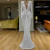 Błyszczące cekinowe sukienki balowe 2022 Długie rękaw Sexy High Slit V Szyjka Syrenka Rose Gold Dubai Women Zuhair Murad Formal Evening Gow296s