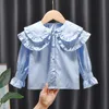 Barnskjortor Baby Girls Blauses Kids Bomullsskjortor Spring Fall Doll Collar Tops 1 till 6 år barns koreanska stilkläder Solid Color 230721