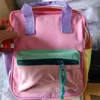 Рюкзаки персиковой желе, лоскут красочный прозрачный плечевой ремень персонализированный магазин женский и детский милый рюкзак 230720