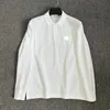 Pull à manches longues pour homme avec broderie classique décontractée.