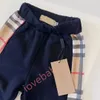 Nieuwe zomer klassieke plaid side shorts broek broek Koreaanse versie van casual mode kinderkleding broek buitenlandse stijl.