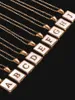 Skorupa ze stali nierdzewnej Letter Naszyjnik Kwadratowy tytan stalowy Początkowy angielski alfabet wisiorek Sweter łańcuch odzież