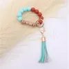 Wholesale food grade silicone beads wrist keychain alloy cap PU leather tassel keychain female multicolor optional DF067