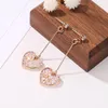 Boucles d'oreilles pendantes Version coréenne de petit pompon frais en forme de coeur coloré pour la fête des femmes