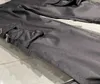 Pantaloni da uomo Pantaloni da jogging autunnali e invernali pantaloni cargo di alta qualità pantaloni di design in materiale confortevole eleganti multi tasche design di giunzione mens di lusso nero Z230727