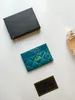 Кредитный держатель мужской и женские держатели карт голубая овчина мини -кожаная монета внутренняя слот карманная сумка бренда