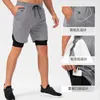 Shorts de corrida masculino elástico de camada dupla com bolso moletom jogger fitness academia treino casual roupa ativa