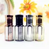 Perfume Bottle 10 pieces/batch 3ml 6ml 12ml gold and silver roll glass bottle small cylinder perfume bottle essential oil container empty refillable 230724