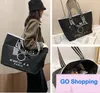 Duffel Bags Luxury Brands Black white Shopping Bags Women Triangle Label Waterproof Leisure Travel Bag Large Capacity Nylon Mommy Tote
